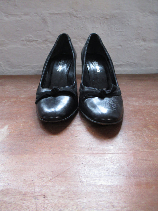 Black leather court shoe