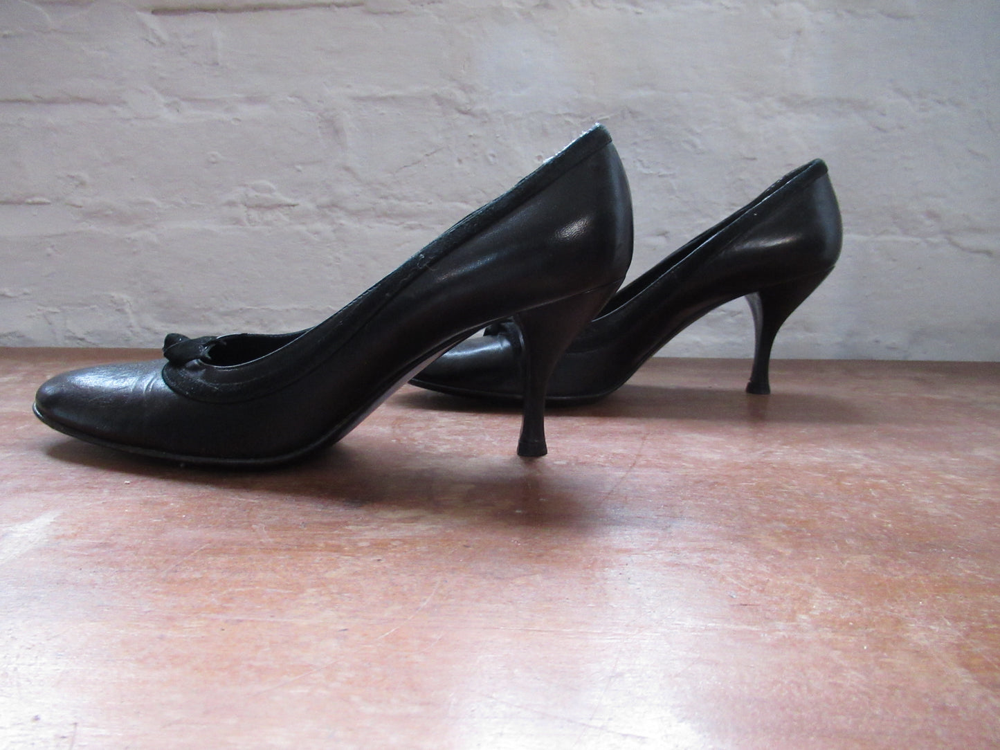 Black leather court shoe