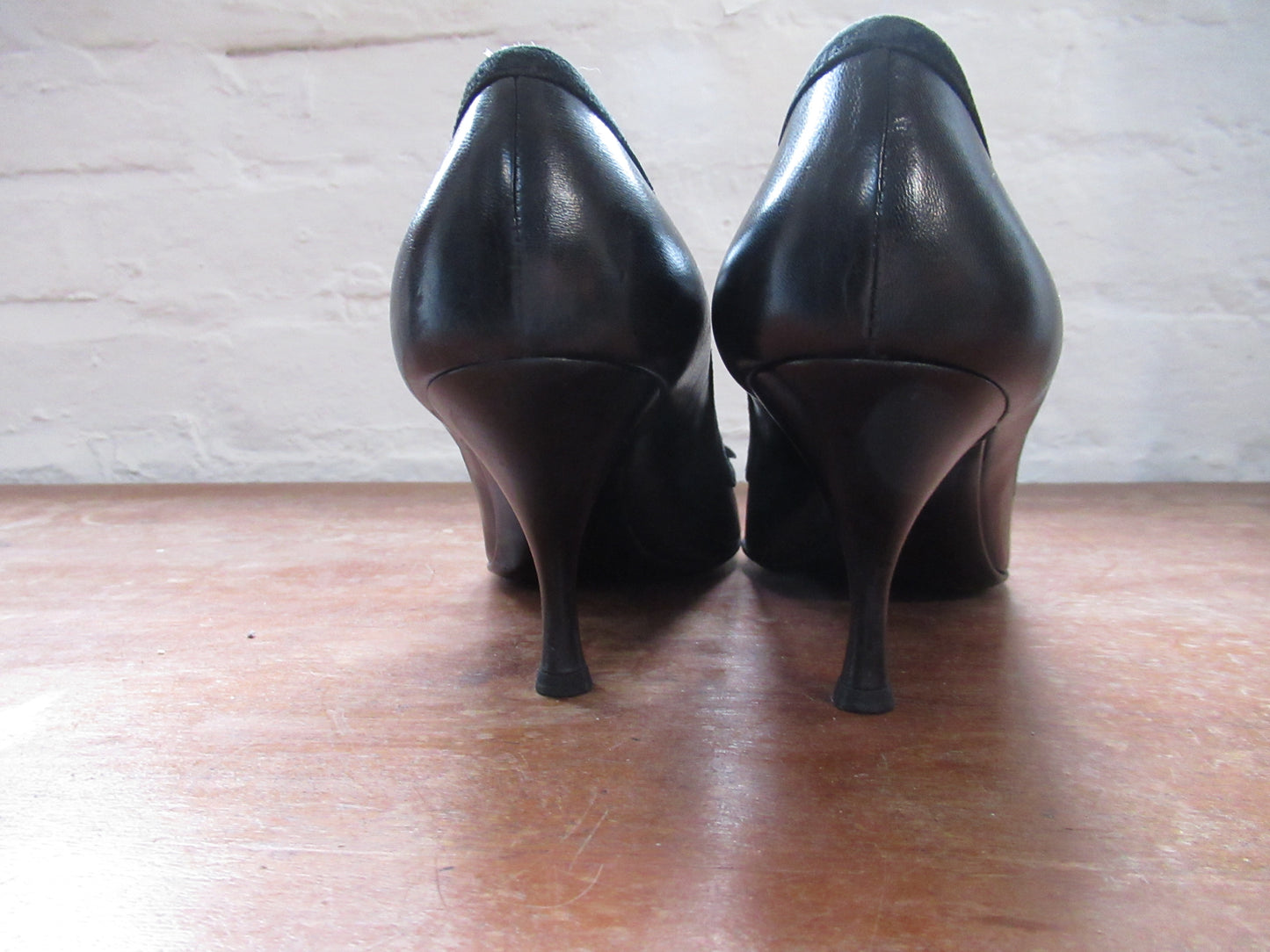 Black leather court shoe