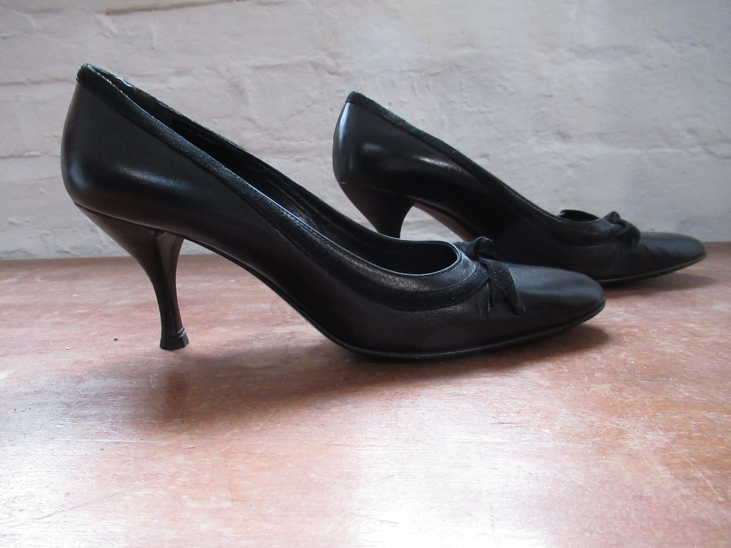 Black leather court shoe